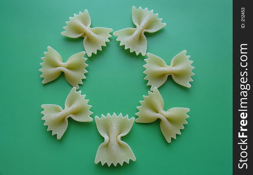 A flower made of pasta pieces. A flower made of pasta pieces