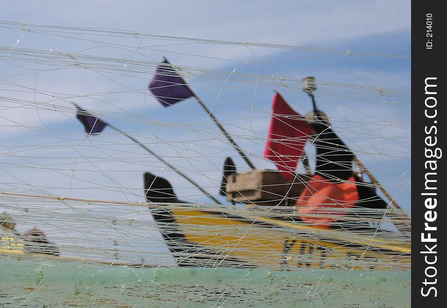 Boat and the fishing nets at Baltic Sea coast (Poland). Boat and the fishing nets at Baltic Sea coast (Poland)