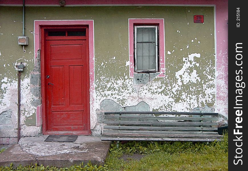 Old cottage with red doors. Old cottage with red doors