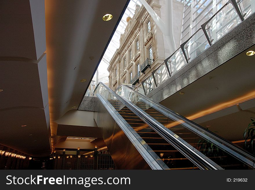 View up an escalator, from below. View up an escalator, from below