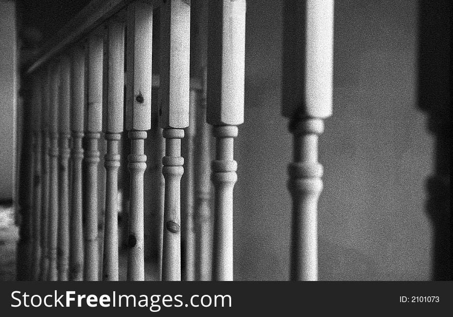 Bw detail shot of wooden banister indoors. Bw detail shot of wooden banister indoors