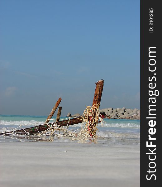 Old fishing tackle on a beach. Old fishing tackle on a beach