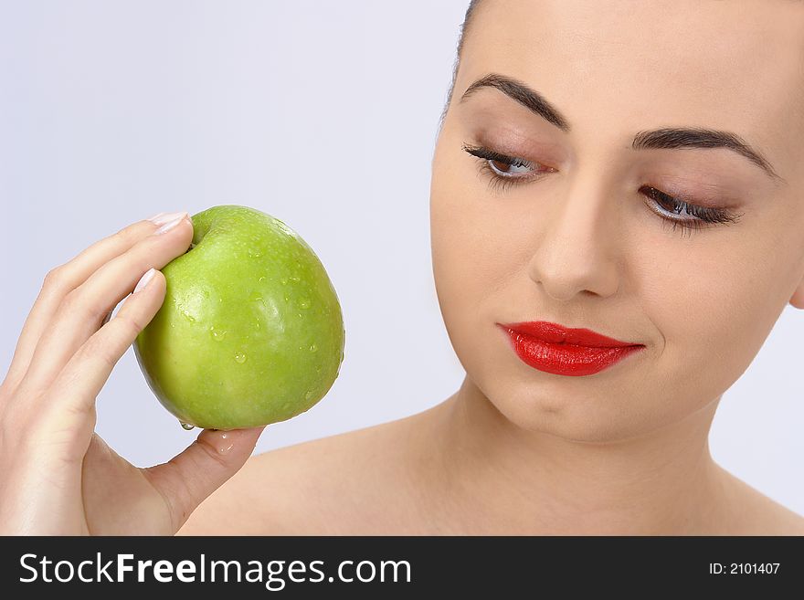 Portrait Of Beauty Woman With Apple