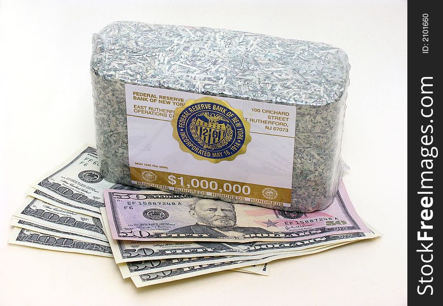 Some paper denominations of US dollars and packing one million dollars. Some paper denominations of US dollars and packing one million dollars