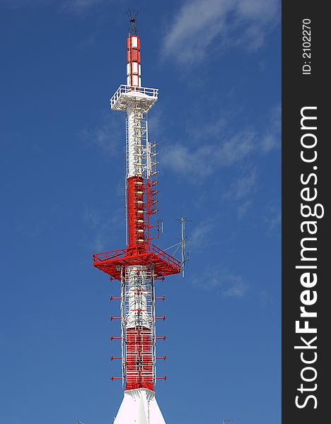 Red and white Telecommunications antenna
