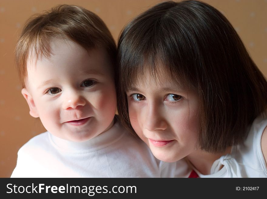 Pretty girl and her cute little brother. Pretty girl and her cute little brother