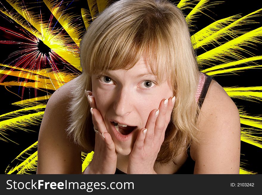 Extreme close-up of a young woman; looking amazed for a firework. Extreme close-up of a young woman; looking amazed for a firework