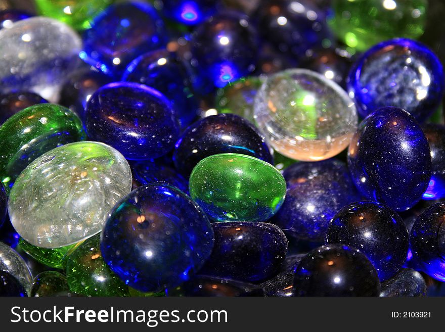 A cloeection of colored glass marbles