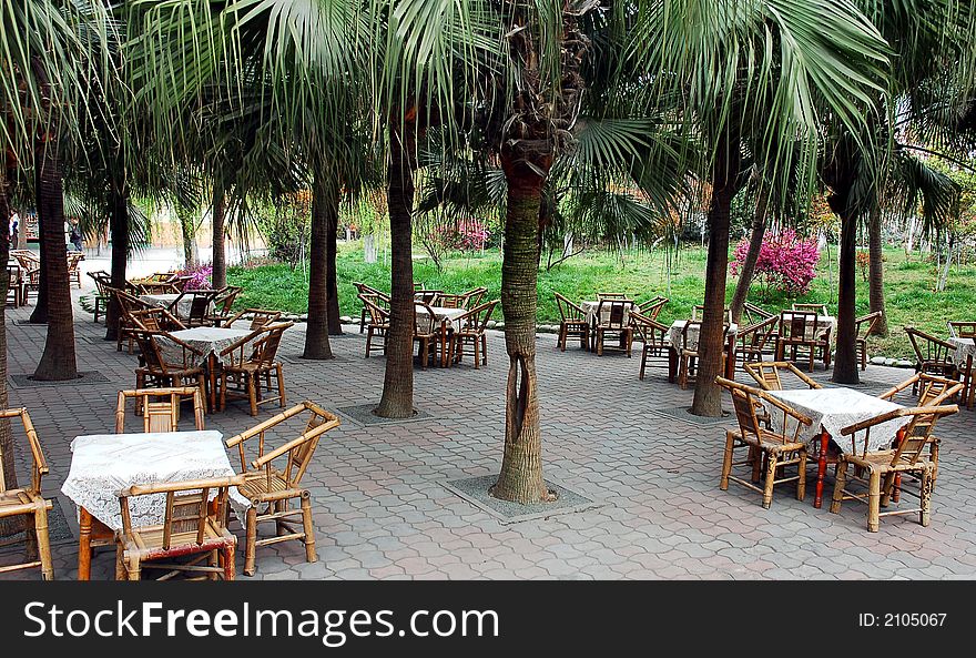 Chairs and tables in a garden in China. Chairs and tables in a garden in China