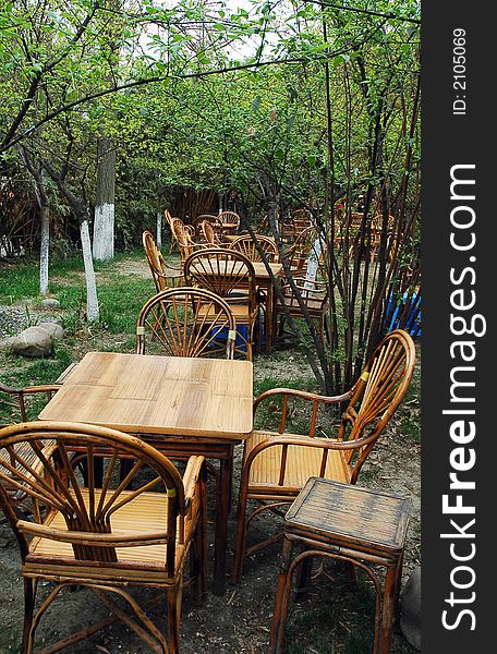 Chairs and tables in a garden in China. Chairs and tables in a garden in China