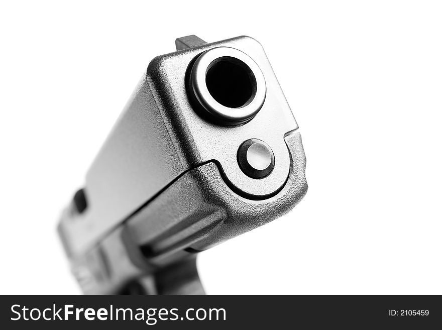 Gun macro isolated on white, shallow dof with focus on front