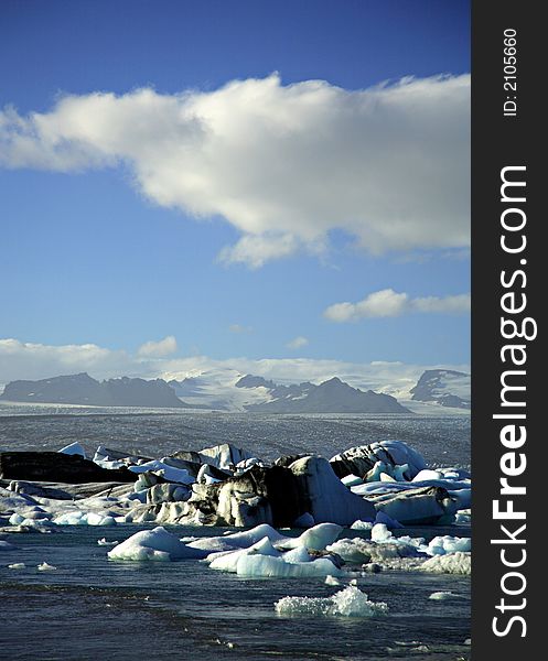 Icebergs With The Glacier In The Distance