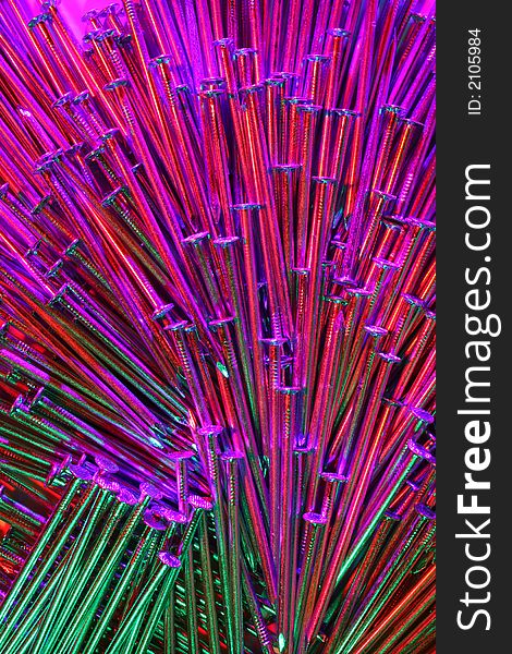 Arrangement of nails,with light from three directions, with different coloured filters before them. Arrangement of nails,with light from three directions, with different coloured filters before them