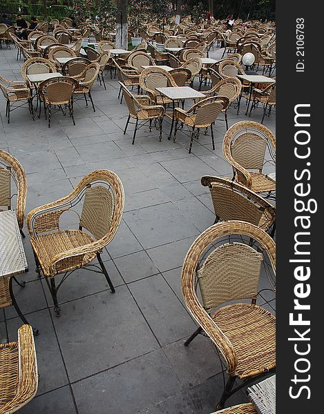 Chairs and tables in a garden in China. Chairs and tables in a garden in China