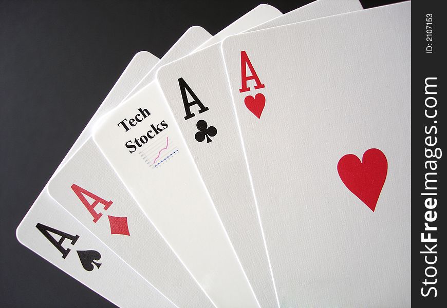 Poker Aces and a Tech Stock card, white on black. Poker Aces and a Tech Stock card, white on black