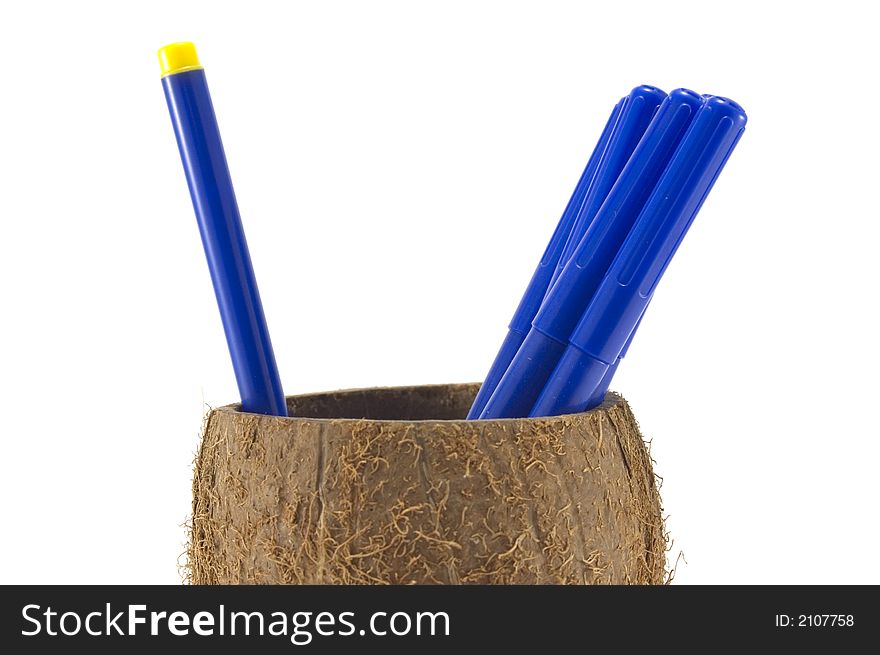 Blue pens in the coconut and one different.