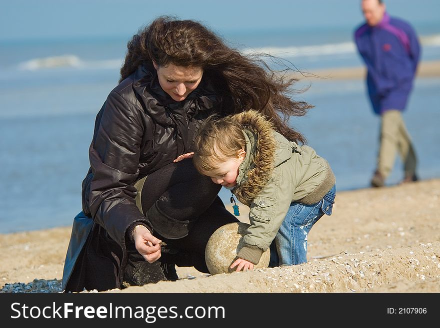 Mother And Cute Boy On The Beach