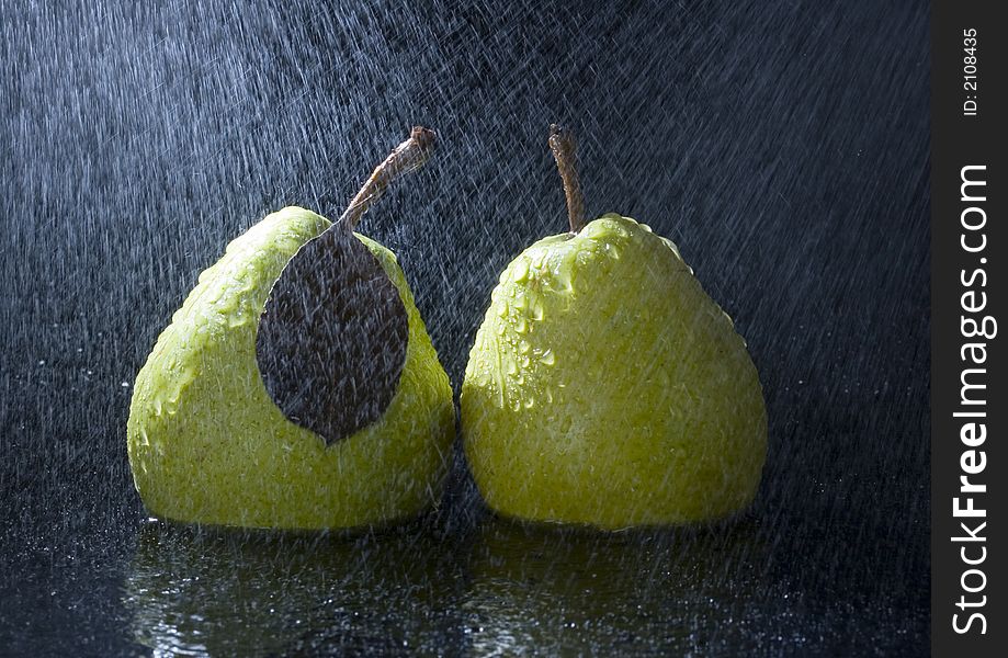 Pear is a fruit that has a yellow or green skin and is white inside. Pears are thinner at the top (i.e. where they join onto the tree) than at the bottom. Pear is a fruit that has a yellow or green skin and is white inside. Pears are thinner at the top (i.e. where they join onto the tree) than at the bottom.