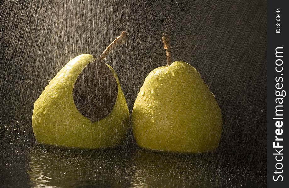 Pear is a fruit that has a yellow or green skin and is white inside. Pears are thinner at the top (i.e. where they join onto the tree) than at the bottom. Pear is a fruit that has a yellow or green skin and is white inside. Pears are thinner at the top (i.e. where they join onto the tree) than at the bottom.