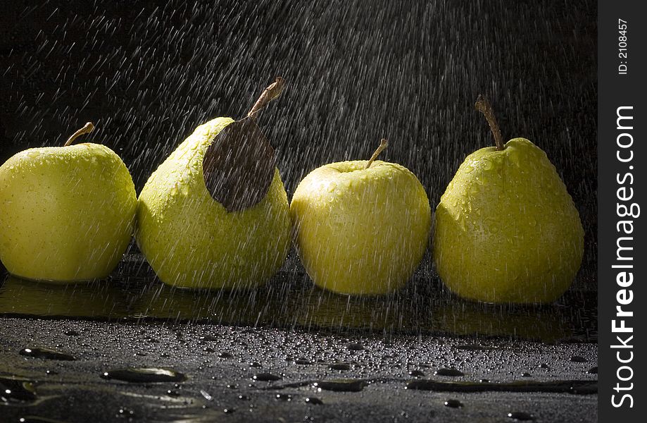 Pear is a fruit that has a yellow or green skin and is white inside. Pears are thinner at the top (i.e. where they join onto the tree) than at the bottom. Pear is a fruit that has a yellow or green skin and is white inside. Pears are thinner at the top (i.e. where they join onto the tree) than at the bottom.