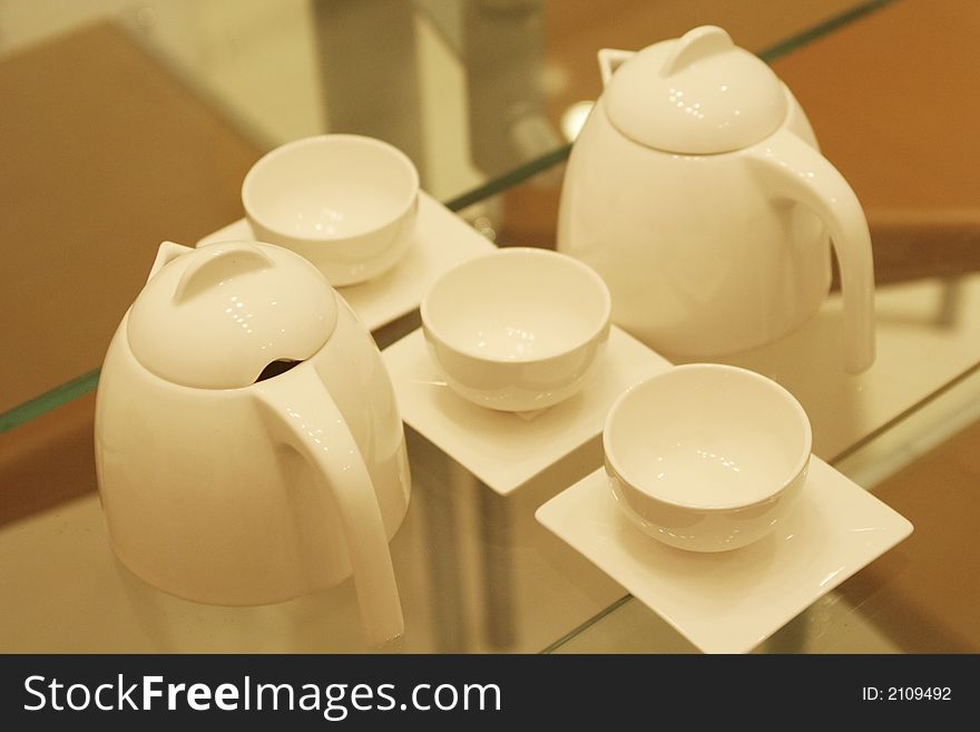 Eletant white teapot and cups made of china porcelain