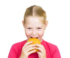 Little Girl Eating Hamburger. Stock Photography Little Girl Eating Hamburger. Stock Photography