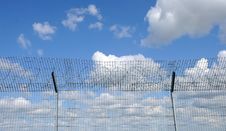 Sky Behind The Fence Royalty Free Stock Photo Sky Behind The Fence Royalty Free Stock Photo