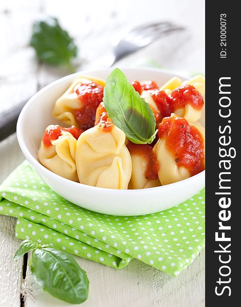 Fresh tortellini with tomato sauce. Fresh tortellini with tomato sauce