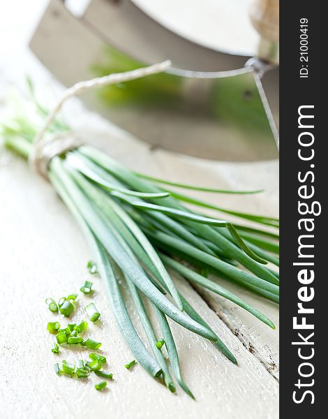 Fresh chives with a mezzaluna