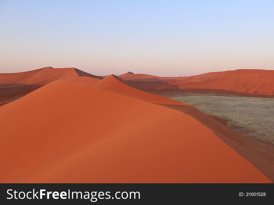 Sossusvlei sand dunes landscape in the Nanib desert near Sesriem, Namibia. Sossusvlei sand dunes landscape in the Nanib desert near Sesriem, Namibia