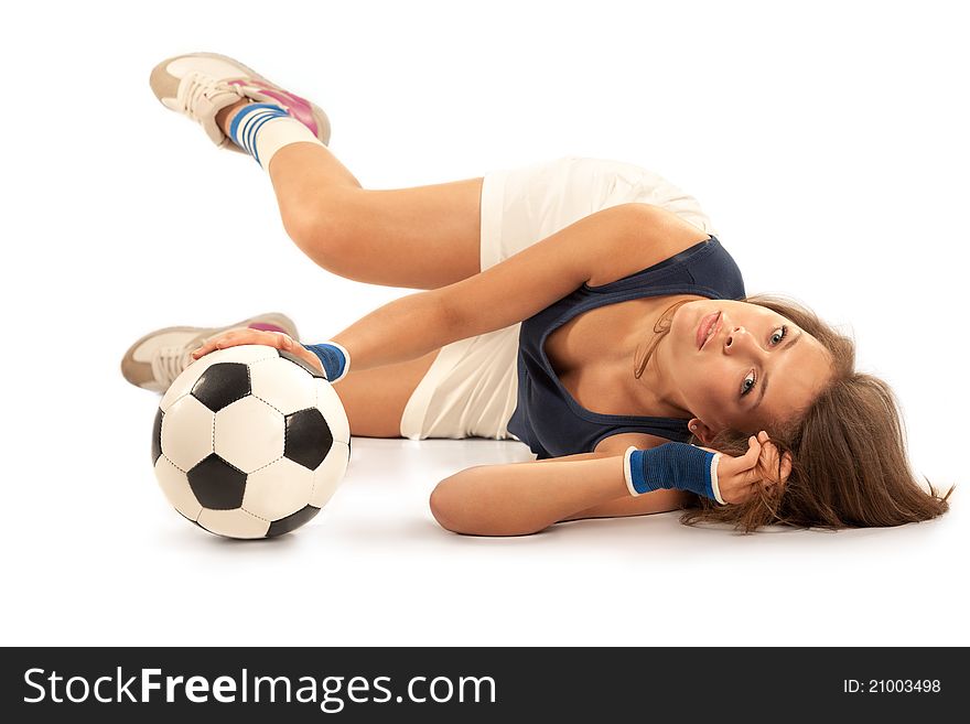 girl doing fitness with soccer ball over white background. girl doing fitness with soccer ball over white background