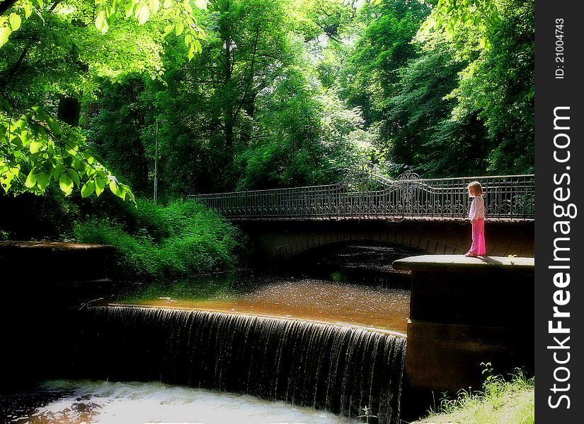 A girl in a city park. A girl in a city park