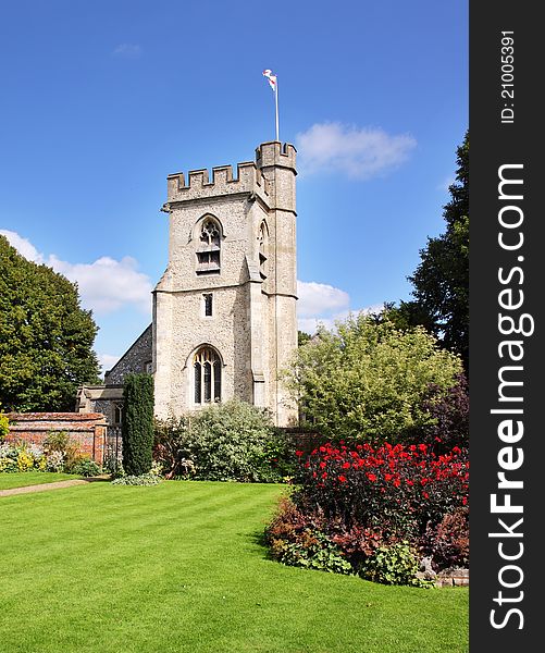 English Village Church and Tower viewed from a Walled garden. English Village Church and Tower viewed from a Walled garden