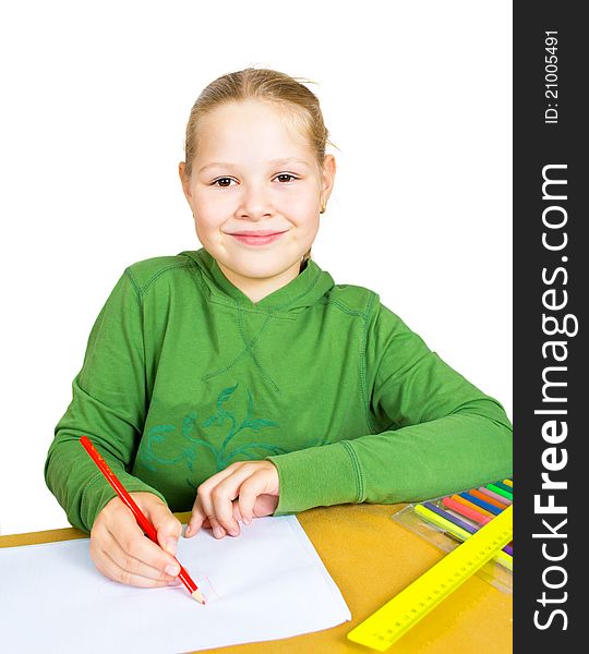 Child draw with colorful pencils, isolated over white
