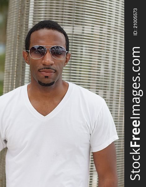 Image of a young black man with cool cunglasses. Image of a young black man with cool cunglasses