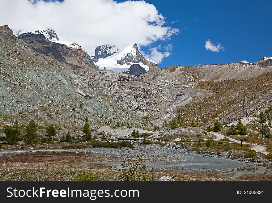 High alpine hiking route near famous mountain Matterhorn (peak Cervino)