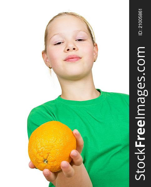 Happy girl with orange isolated on white