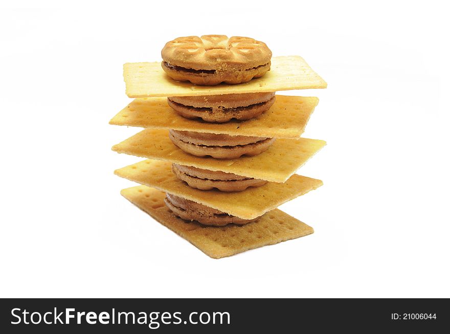 Pile of healthy biscuits in round and square shape. Pile of healthy biscuits in round and square shape.