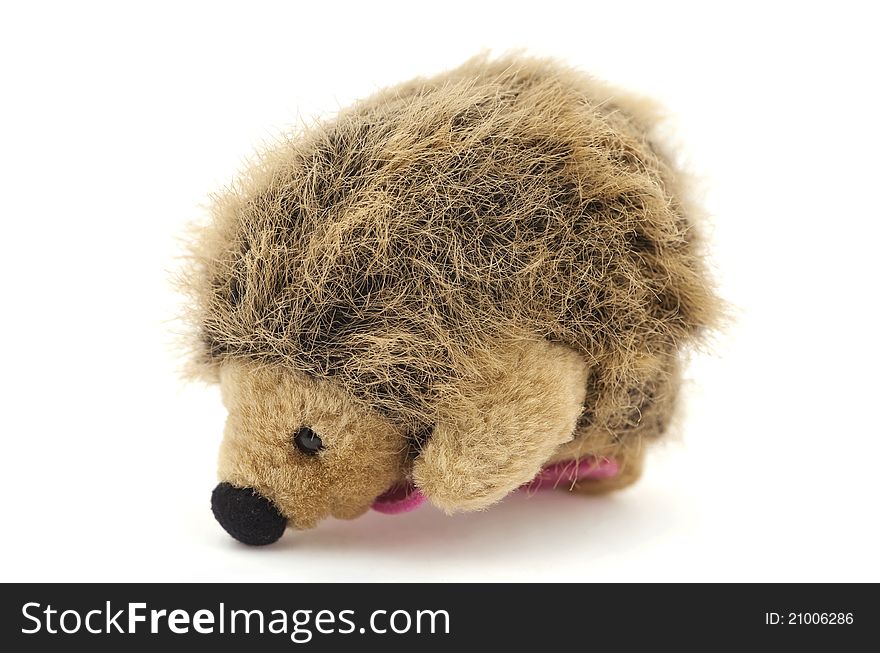 A toy stuffed hedgehog on the white background. A toy stuffed hedgehog on the white background