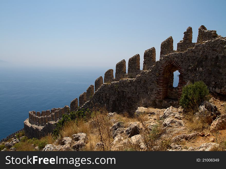 Wall of the castle on a hill near Alanya Turkey