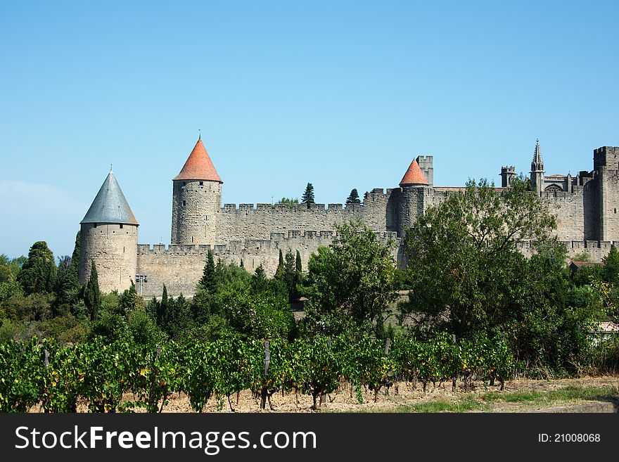 View on vineyards and Carcassonne castle in France, Languedoc. View on vineyards and Carcassonne castle in France, Languedoc