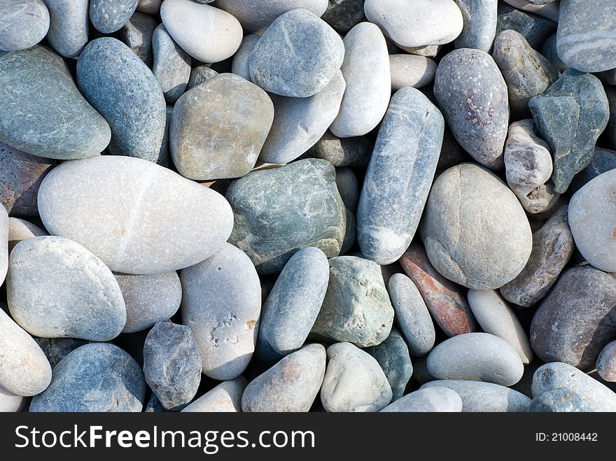 Texture of gray sea pebbles