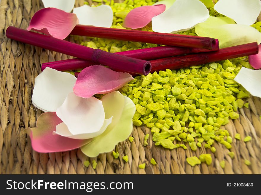 White and pink petals on a green background. White and pink petals on a green background