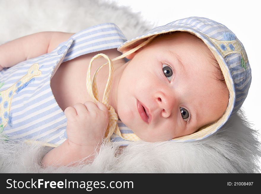 Smiling baby boy in diaper sleeping on stomach. Smiling baby boy in diaper sleeping on stomach