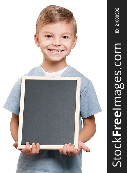 Portrait of a little boy holding a blackboard over white background. Portrait of a little boy holding a blackboard over white background