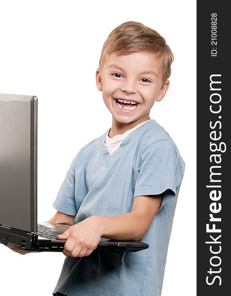 Portrait of funny little boy with notebook over white background