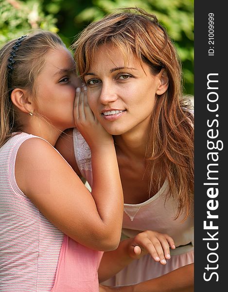 Happy mother with her daughter in park outdoors. Happy mother with her daughter in park outdoors