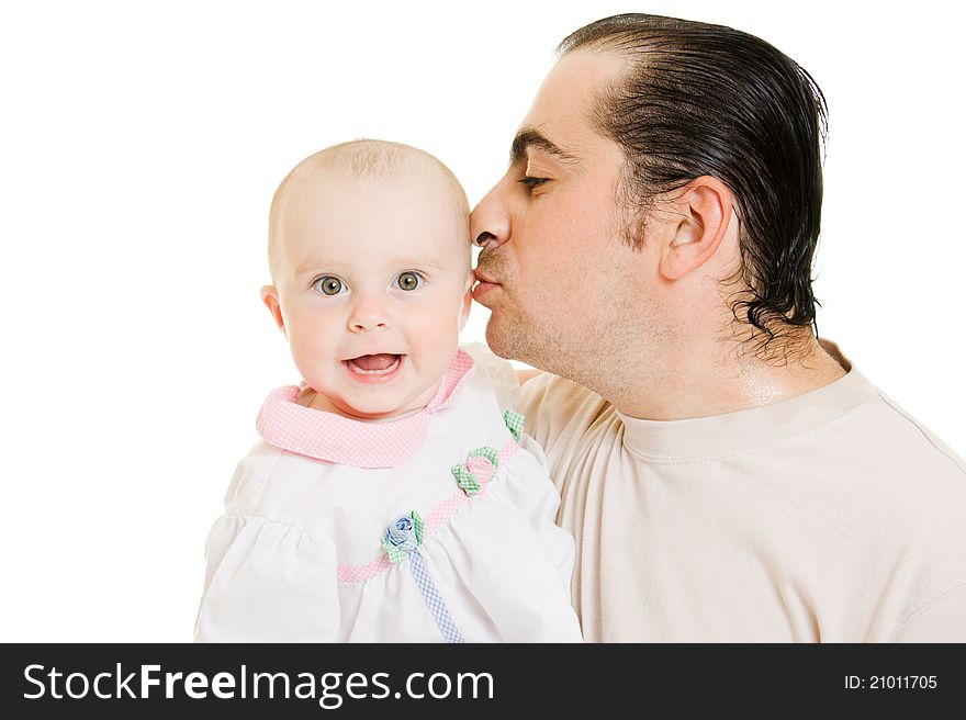 Father kissing daughter on a white background.