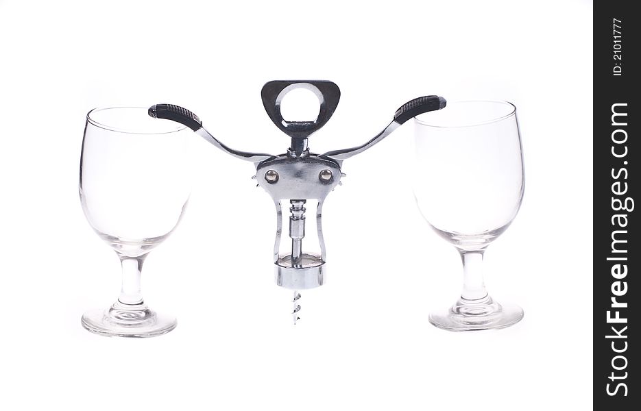 A background of empty glasses and a corkscrew. A background of empty glasses and a corkscrew.