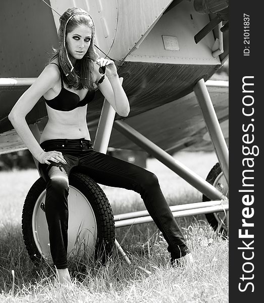 Female portrait. retro style aircraft pilot